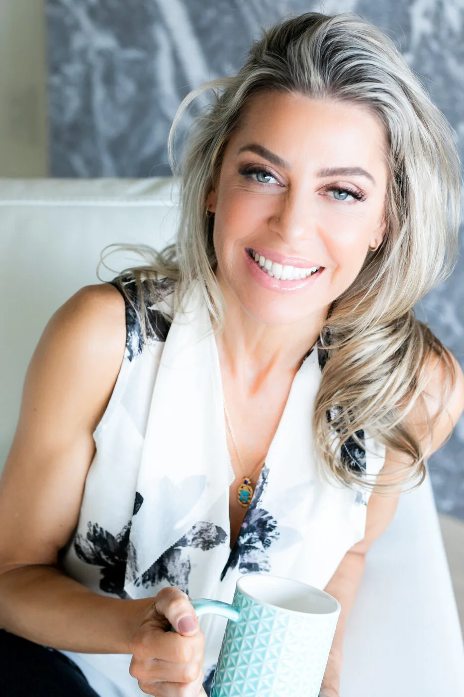 Dr. Jordana Aziz smiling, seated